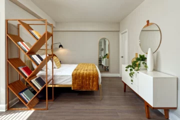 A fully staged studio bedroom at 1500 Arlington